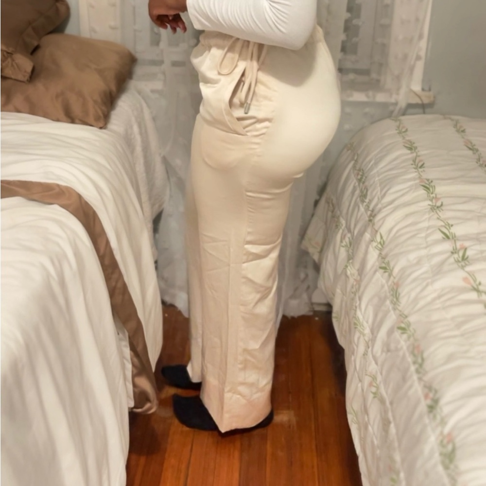 Champagne color, silk material work pants from H&M
